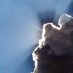 Silver-Lined Clouds of Venus and Neptune