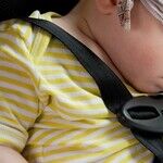 Child in Car Seat Falls out of Moving Car. Jail the Mom?