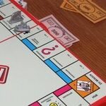 Playing Monopoly for Real