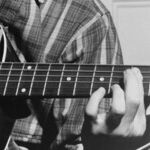Woody Guthrie, By God