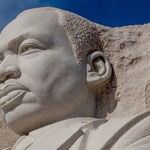 Why Martin Luther King Couldn't Get a Carry Permit: Several Groups Urging the Supreme Court to Overturn New York's Virtual Ban on Bearing Arms Emphasize the Policy's Racist Roots and Impact