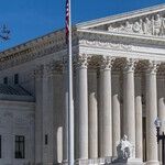 Why Martin Luther King Couldn't Get a Carry Permit: Several Groups Urging the Supreme Court to Overturn New York's Virtual Ban on Bearing Arms Emphasize the Policy's Racist Roots and Impact